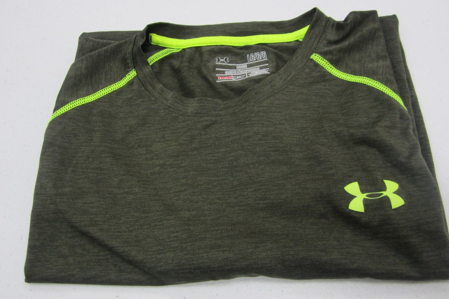 NWOT UNDER ARMOUR HEAT GEAR LADIES  LOOSE FIT ATHLETIC TOP LOGO Size Large