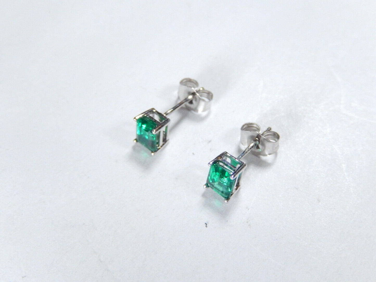 10k White Gold .75 CT TW 5mm x 4mm Lab Created Emerald Earrings Studs