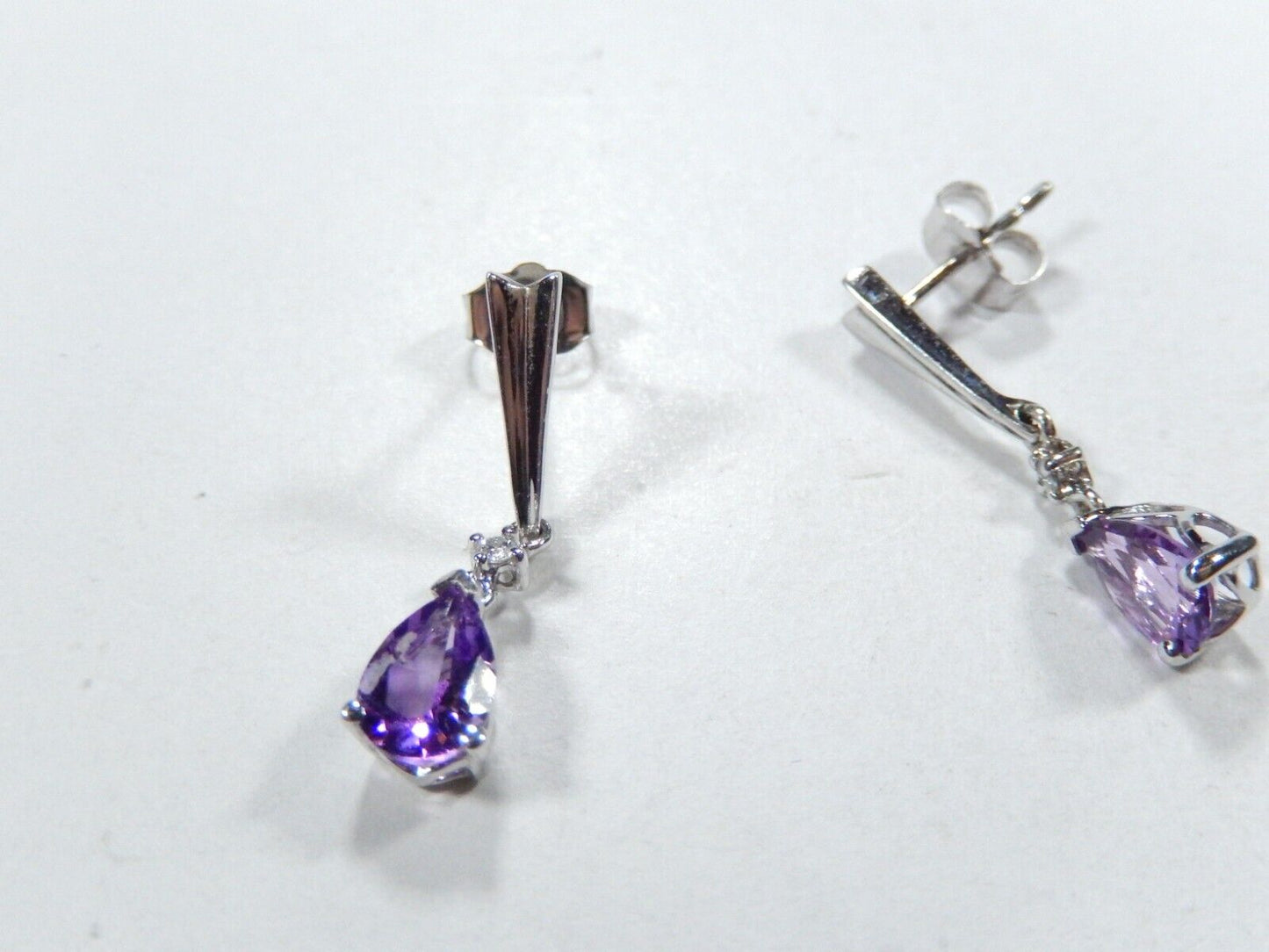 10k White Gold .75CT TW Diamond and Pear Shape Amethyst Dangle Earrings