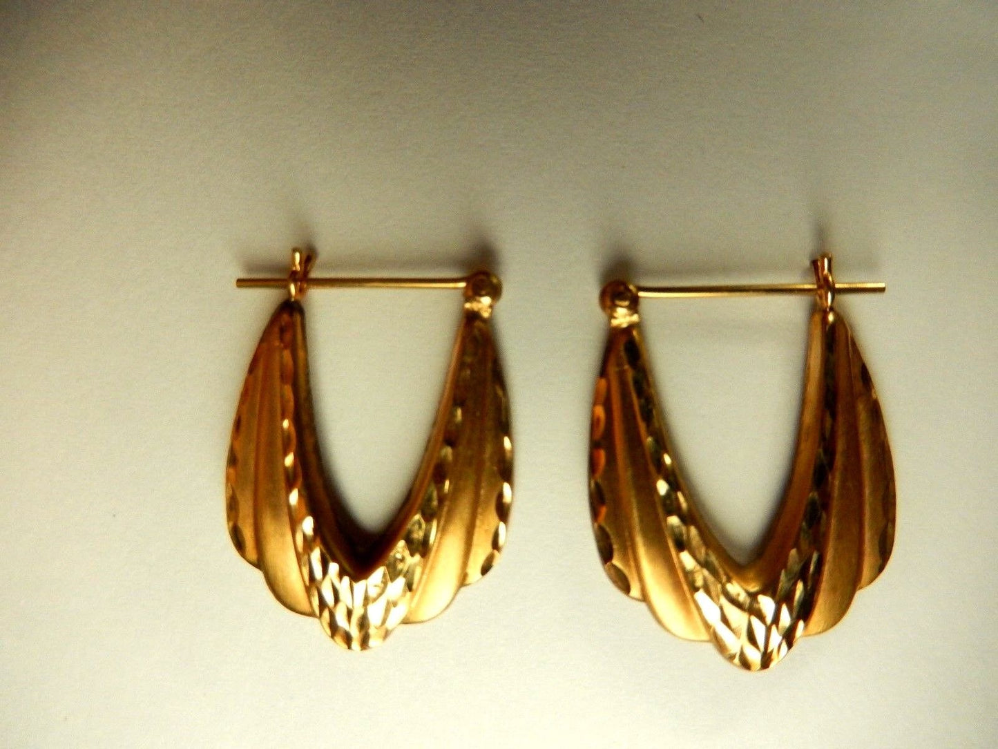 Solid 14k Yellow Gold Puff Oval Hoop Earrings Decorative Cut Design 19mm Diam.