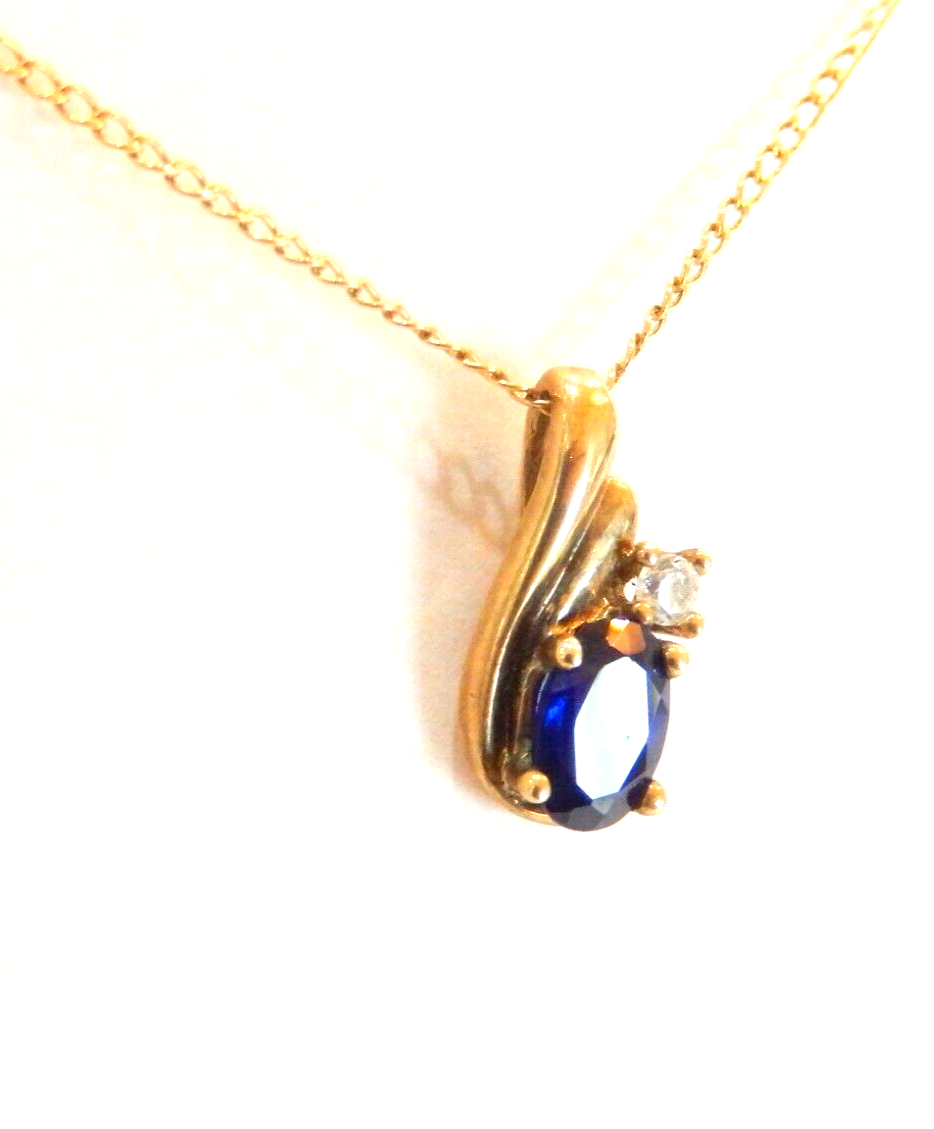 10k Yellow Gold Oval Sapphire And Diamond Pendant with 18" Chain
