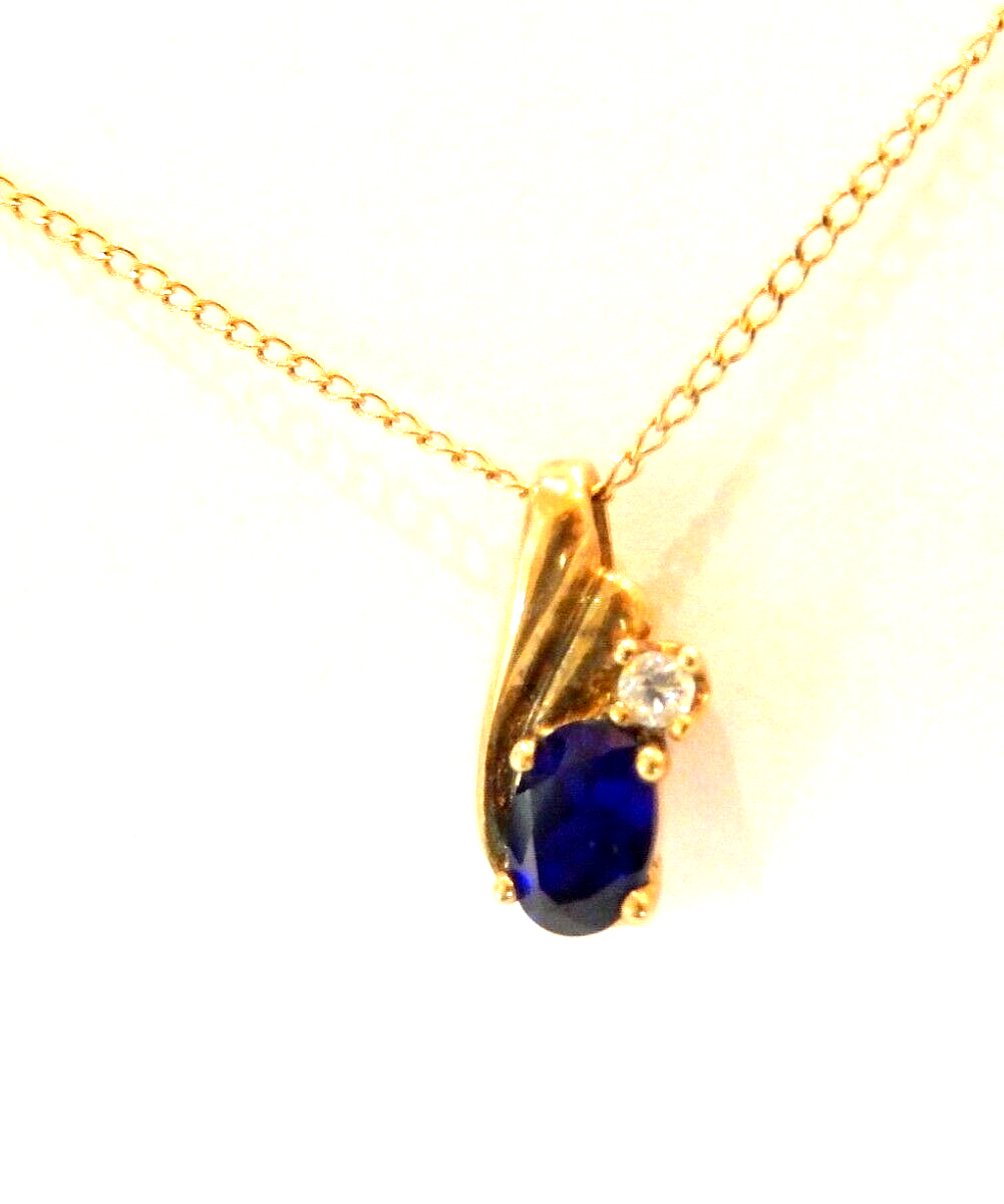10k Yellow Gold Oval Sapphire And Diamond Pendant with 18" Chain